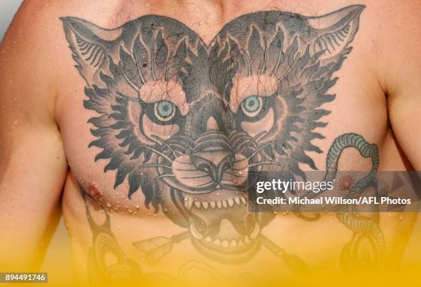 The tattoo of Cameron O'Shea is seen during the Carlton Blues AFL pre-season training session at Mooloolaba Beach on December 17, 2017 on the...