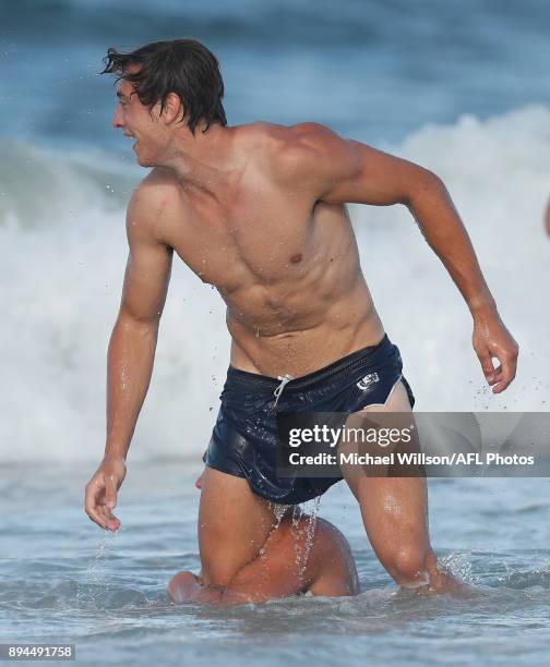 Caleb Marchbank and Charlie Curnow of the Blues in action during the Carlton Blues AFL pre-season training session at Mooloolaba Beach on December...