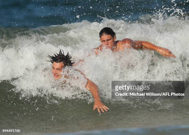 Caleb Marchbank and Charlie Curnow of the Blues in action during the Carlton Blues AFL pre-season training session at Mooloolaba Beach on December...