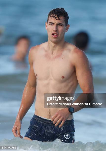 Tom Williamson of the Blues looks on during the Carlton Blues AFL pre-season training session at Mooloolaba Beach on December 17, 2017 on the...