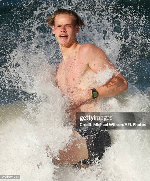 Tom De Koning of the Blues in action during the Carlton Blues AFL pre-season training session at Mooloolaba Beach on December 17, 2017 on the...