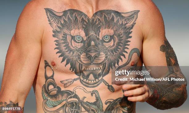 The tattoo of Cameron O'Shea is seen during the Carlton Blues AFL pre-season training session at Mooloolaba Beach on December 17, 2017 on the...