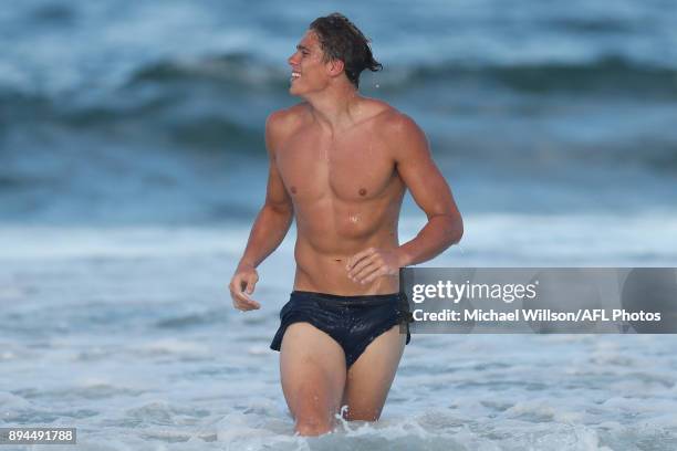 Charlie Curnow of the Blues looks on during the Carlton Blues AFL pre-season training session at Mooloolaba Beach on December 17, 2017 on the...