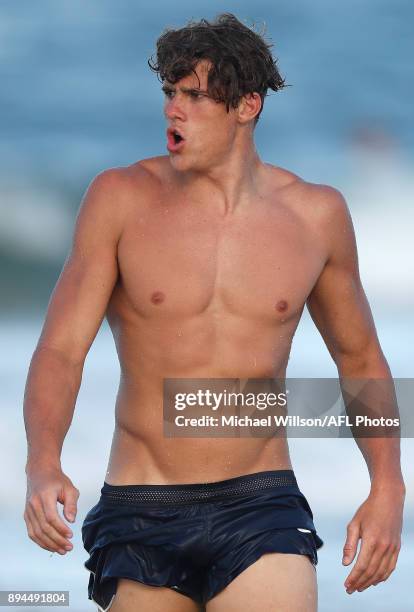 Charlie Curnow of the Blues looks on during the Carlton Blues AFL pre-season training session at Mooloolaba Beach on December 17, 2017 on the...