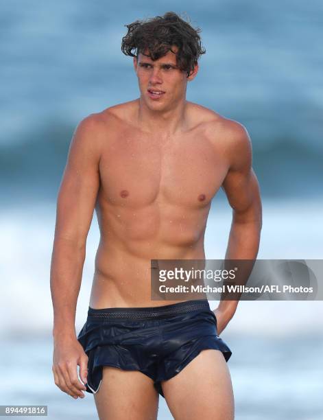 Charlie Curnow of the Blues looks on during the Carlton Blues AFL pre-season training session at Mooloolaba Beach on December 17, 2017 on the...
