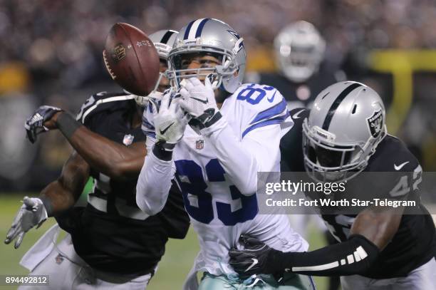 Dallas Cowboys wide receiver Terrance Williams cannot hang on to a pass as Oakland Raiders strong safety Karl Joseph hits him in the third quarter on...