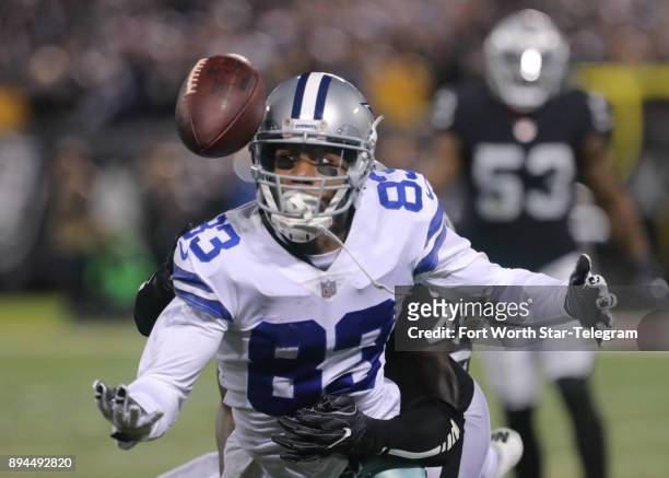 Dallas Cowboys wide receiver Terrance Williams cannot hang on to a pass as Oakland Raiders strong safety Karl Joseph hits him in the third quarter on...
