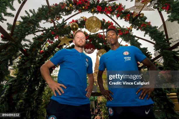 Scott Jamieson and Bruce Kamau of Melbourne City pose at the Christmas site during an A-League media opportunity at Federation Square on December 18,...