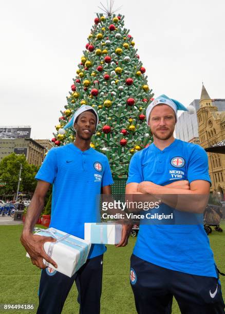 Scott Jamieson and Bruce Kamau of Melbourne City pose at the Christmas site during an A-League media opportunity at Federation Square on December 18,...