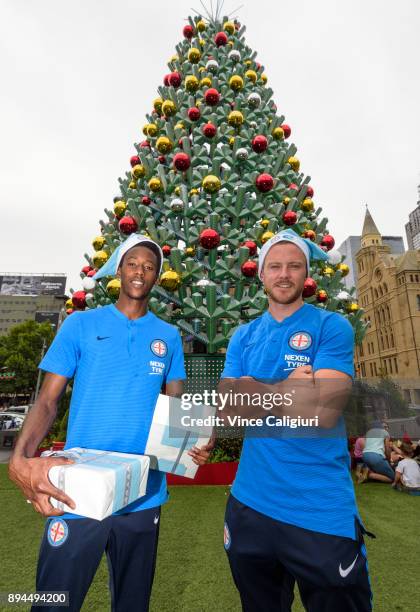 Scott Jamieson and Bruce Kamau of Melbourne City pose at the Christmas site during an A-League media opportunity at Federation Square on December 18,...