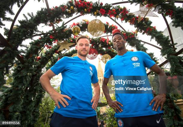 Scott Jamieson and Bruce Kamau of Melbourne City pose at the Christmas site during an A-League media opportunity at Federation Square on December 18,...