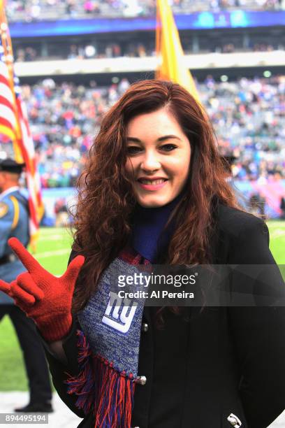 Mandy Harvey performs The National Anthem at the Philadelphia Eagles vs New York Giants game at MetLife Stadium on December 17, 2017 in East...