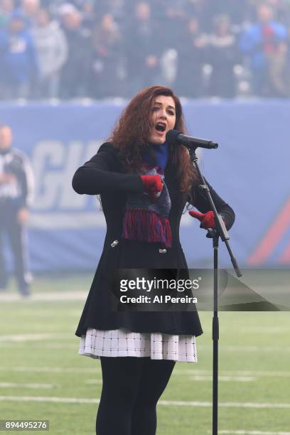 Mandy Harvey performs The National Anthem at the Philadelphia Eagles vs New York Giants game at MetLife Stadium on December 17, 2017 in East...