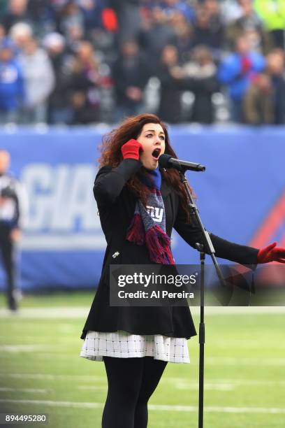 Mandy Harvey performs The National Anthem at the Philadelphia Eagles vs New York Giants game at MetLife Stadium on December 17, 2017 in East...