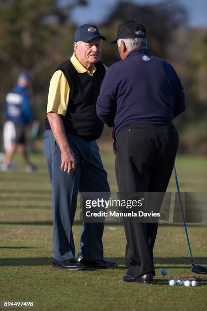 Jack Nicklaus and Lee Trevino chat on the driving range before the final round of the PNC Father/Son Challenge at The Ritz-Carlton Golf Club on...