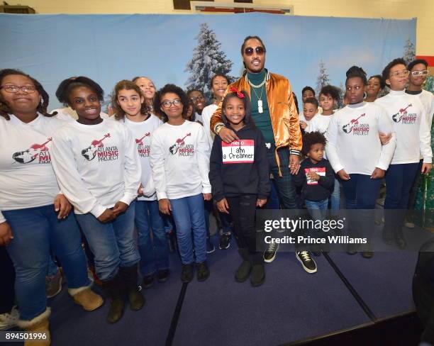 Londyn Wilburn, Future and Future Zahir Wilburn attend the 5th annual FreeWishes Foundation Winter Wishland at Bessie Branham Park on December 17,...