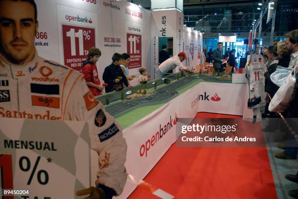 Hobbies and Leisure Fair. IFEMA. Madrid. Young people simulate Fernando Aonso in races of cars.