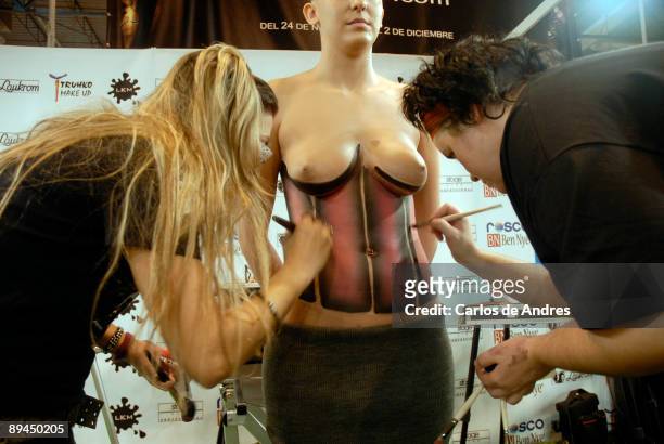Hobbies and Leisure Fair. IFEMA. Madrid. Painting the body to a model.
