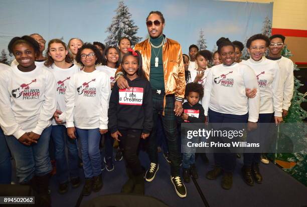 Londyn Wilburn, Future and Future Zahir Wilburn attend the 5th annual FreeWishes Foundation Winter Wishland at Bessie Branham Park on December 17,...