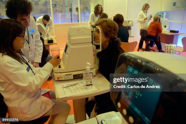 Medicine and health. Expo Health. IFEMA. Madrid. 2008. Ocular checkup to pensioner.