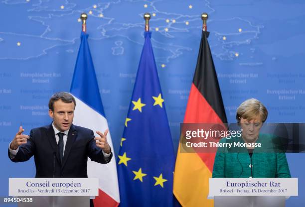 French President Emmanuel Macron and the German Chancellor Angela Merkel are talking to media at the end of a 2 days EU Summit in the Justus Lipsius,...