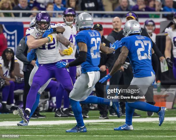 Kyle Rudolph of the Minnesota Vikings runs with the football against the Detroit Lions during an NFL game at Ford Field on November 23, 2016 in...