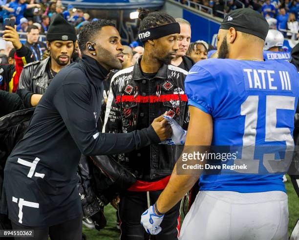 Jason Derulo shakes hands with Golden Tate of the Detroit Lions just before half time during an NFL game against the Minnesota Vikings at Ford Field...