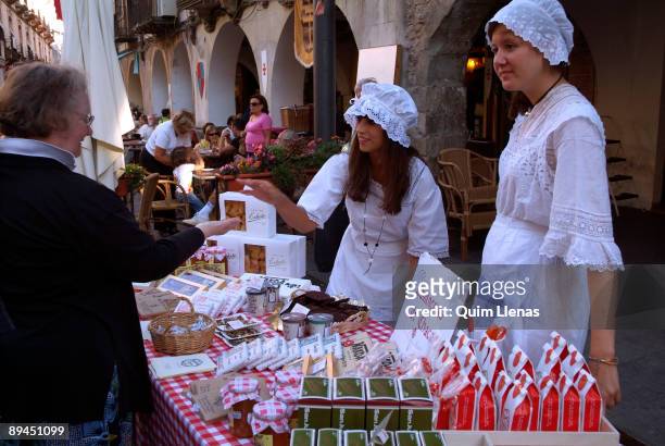 August 21, 2008. Jaca, Huesca, Aragon, Spain. Festival of Jaca . Medieval market, in the historical center of the city. In the picture, tasting...