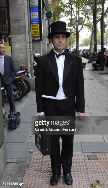 November 14, 2008. Madrid, Spain. 'El Cobrador del Frac', the name of a company which specialises in sending men dressed in a formal dress suit to...