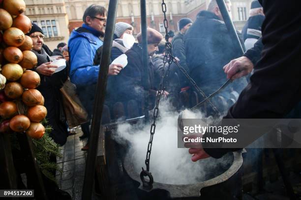 Hundreds of people came for a warm meal to the Christmas Eve Supper for the homeless and poor at the Main Square in Krakow, Poland on 17 December,...
