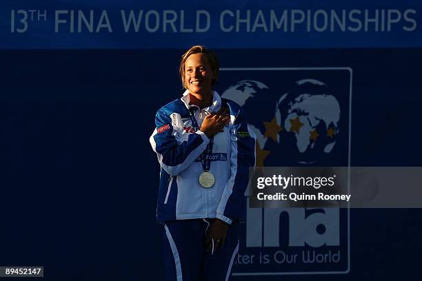 Federica Pellegrini of Italy receives the gold medal during the medal ceremony for the Women's 200m Freestyle Final during the 13th FINA World...