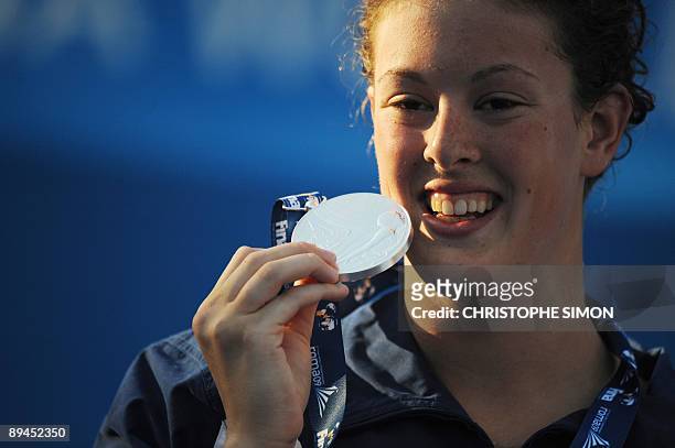 Silver medalist United States's Allison Schmitt celebrates on the podium of the women's 200m freestyle final on July 29, 2009 at the FINA World...