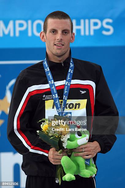 Ryan Cochrane of Canada receives the bronze medal at the medal ceremony for theMen's 800m Freestyle Final during the 13th FINA World Championships at...