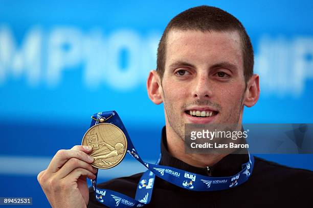 Ryan Cochrane of Canada receives the bronze medal at the medal ceremony for theMen's 800m Freestyle Final during the 13th FINA World Championships at...