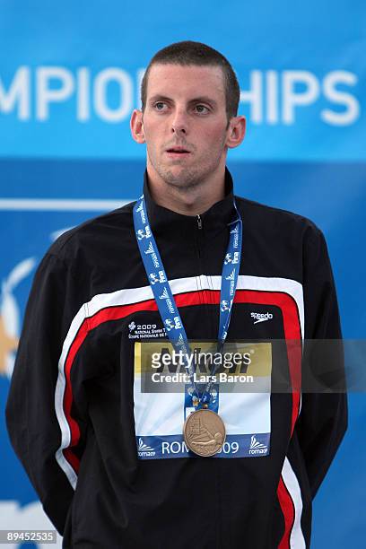 Ryan Cochrane of Canada receives the bronze medal at the medal ceremony for theMen's 800m Freestyle Final during the 13th FINA World Championships at...