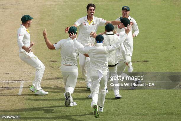 Australia celebrate after defeating England to retake the Ashes during day five of the Third Test match during the 2017/18 Ashes Series between...