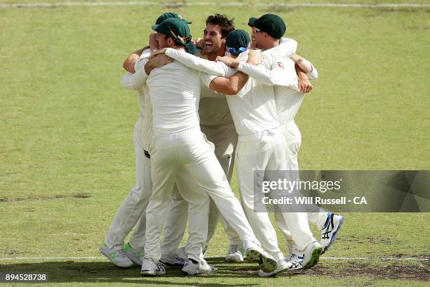 Australia celebrate after defeating England to retake the Ashes during day five of the Third Test match during the 2017/18 Ashes Series between...