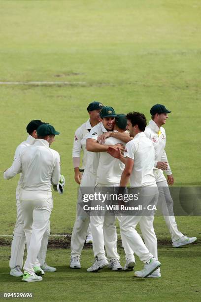 Australia celebrate after defeating England to retake the Ashes during day five of the Third Test match during the 2017/18 Ashes Series between...