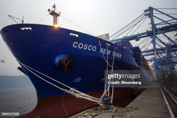 The Cosco New York shipping container sits docked at the Jawaharlal Nehru Port, operated by Jawaharlal Nehru Port Trust , in Navi Mumbai,...