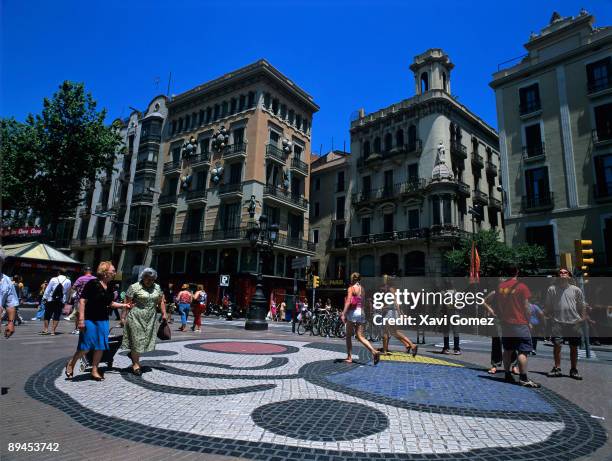 Barcelona. Cataluna. The Ramblas. People walking.