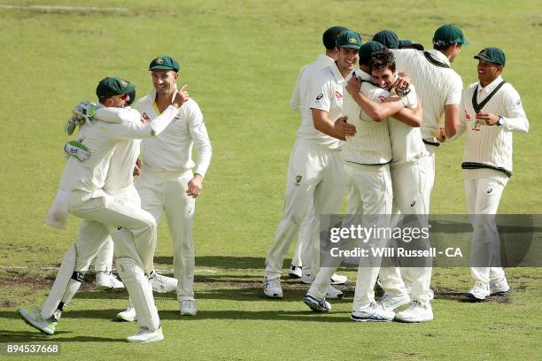 Australia celebrate after defeating England to retake the Ashes during day five of the Third Test match during the 2017/18 Ashes Series between...