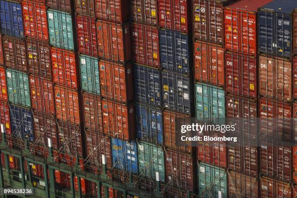 Shipping containers sit stacked on the Hyundai Force container ship at the Jawaharlal Nehru Port, operated by Jawaharlal Nehru Port Trust , in Navi...