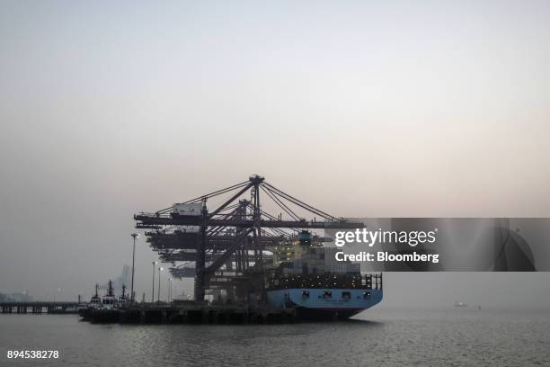 The Maersk Taurus container ship sits docked at the Jawaharlal Nehru Port, operated by Jawaharlal Nehru Port Trust , in Navi Mumbai, Maharashtra,...