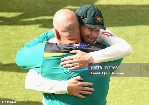 Steve Smith and Darren Lehmann of Australia celebrate winning during day five of the Third Test match during the 2017/18 Ashes Series between...