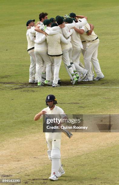 Ausralia celebrate after Pat Cummins of Australia claimed the final wicket of Chris Woakes of England to claim victory during day five of the Third...