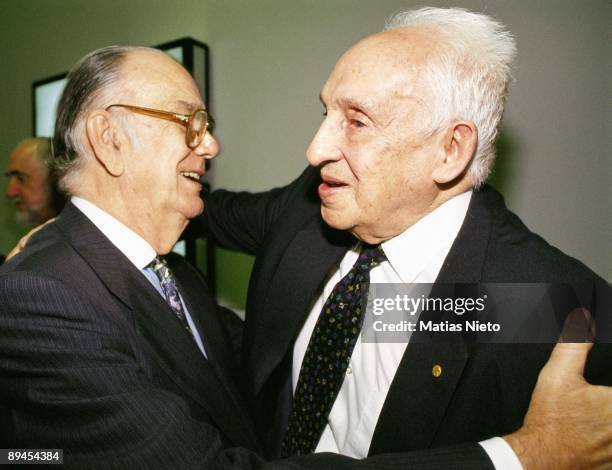 Severe Ochoa hugs his friend Camilo Jose Cela Severe Ochoa hugs his friend Camilo Jose Cela. In the exhibition "50 anos de Pascual Duarte "