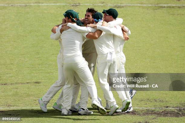 Australia celebrate after defeating England to retake the Ashes during day five of the Third Test match during the 2017/18 Ashes Series between...