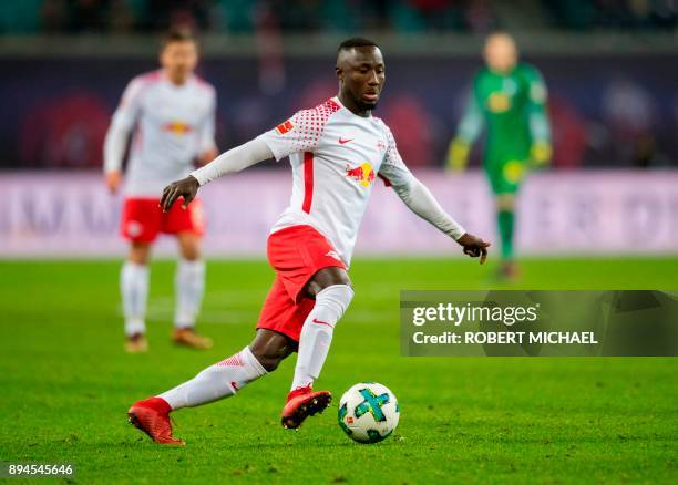 Leipzig's Guinean midfielder Naby Keita plays the ball during the German first division Bundesliga football match between RB Leipzig and Hertha BSC...