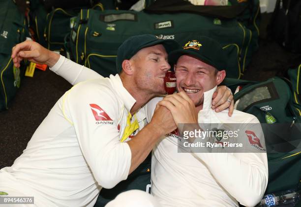 David Warner and Cameron Bancroft of Australia celebrate in the changerooms after Australia regained the Ashes during day five of the Third Test...