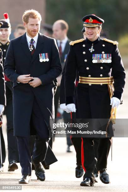 Prince Harry accompanied by Major General Paul Nanson attends The Sovereign's Parade at the Royal Military Academy Sandhurst on December 15, 2017 in...